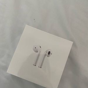 AIRPODS WITH CHARGING CASE -BRAND NEW